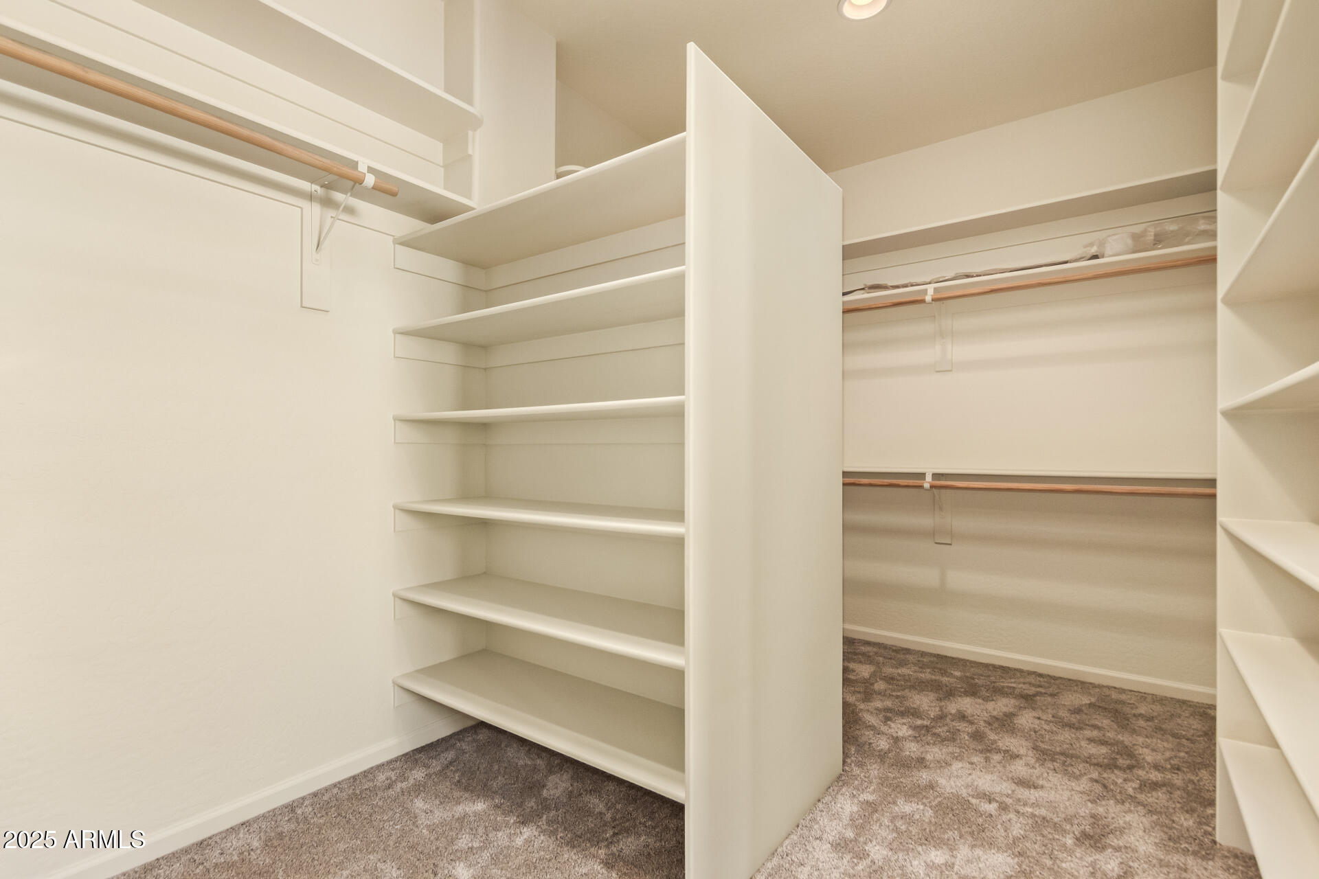 945 North Mountain View Road Apache Junction, AZ 85119 - Photo 25 of 53 a view of walk in closet with empty racks