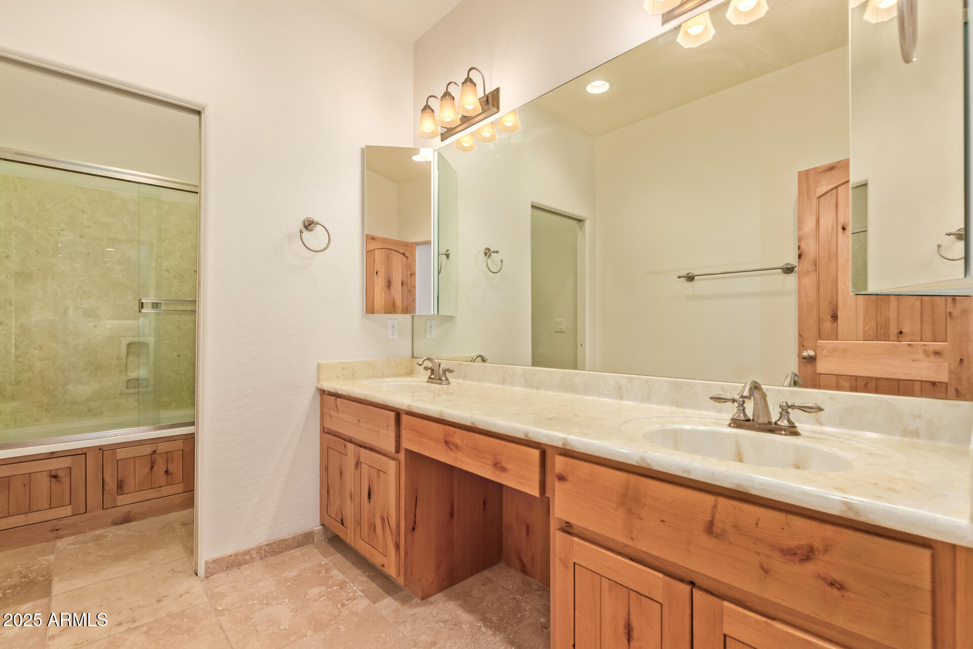 945 North Mountain View Road Apache Junction, AZ 85119 - Photo 33 of 53 a bathroom with a granite countertop sink mirror and double