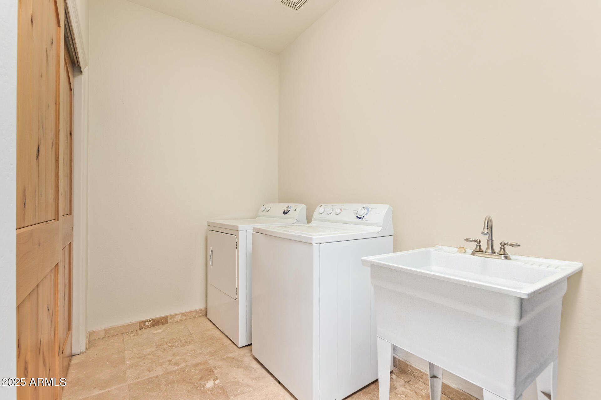945 North Mountain View Road Apache Junction, AZ 85119 - Photo 35 of 53 a utility room with dryer and washer