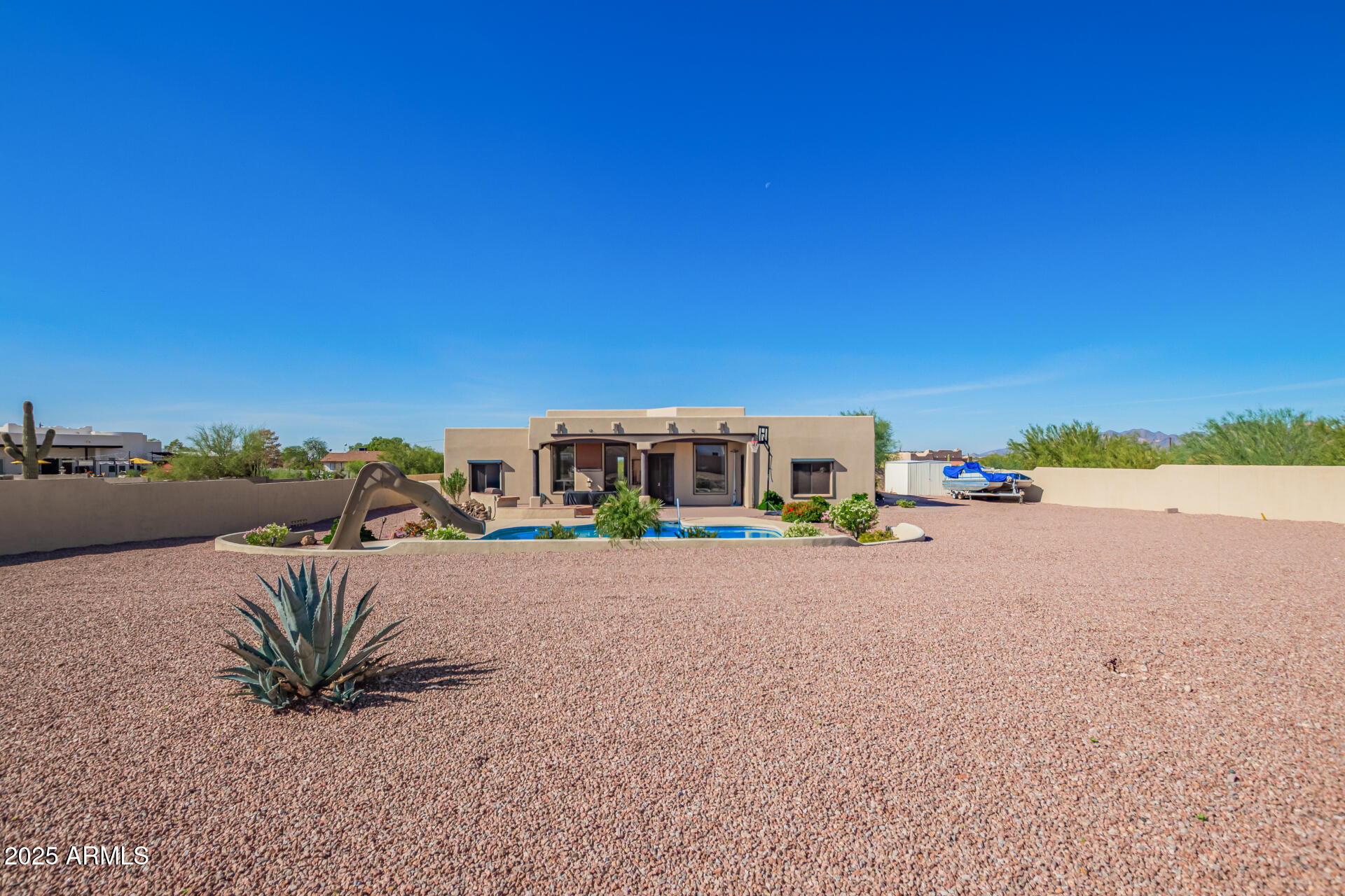 945 North Mountain View Road Apache Junction, AZ 85119 - Photo 39 of 53 a view of a street with a table and a chairs