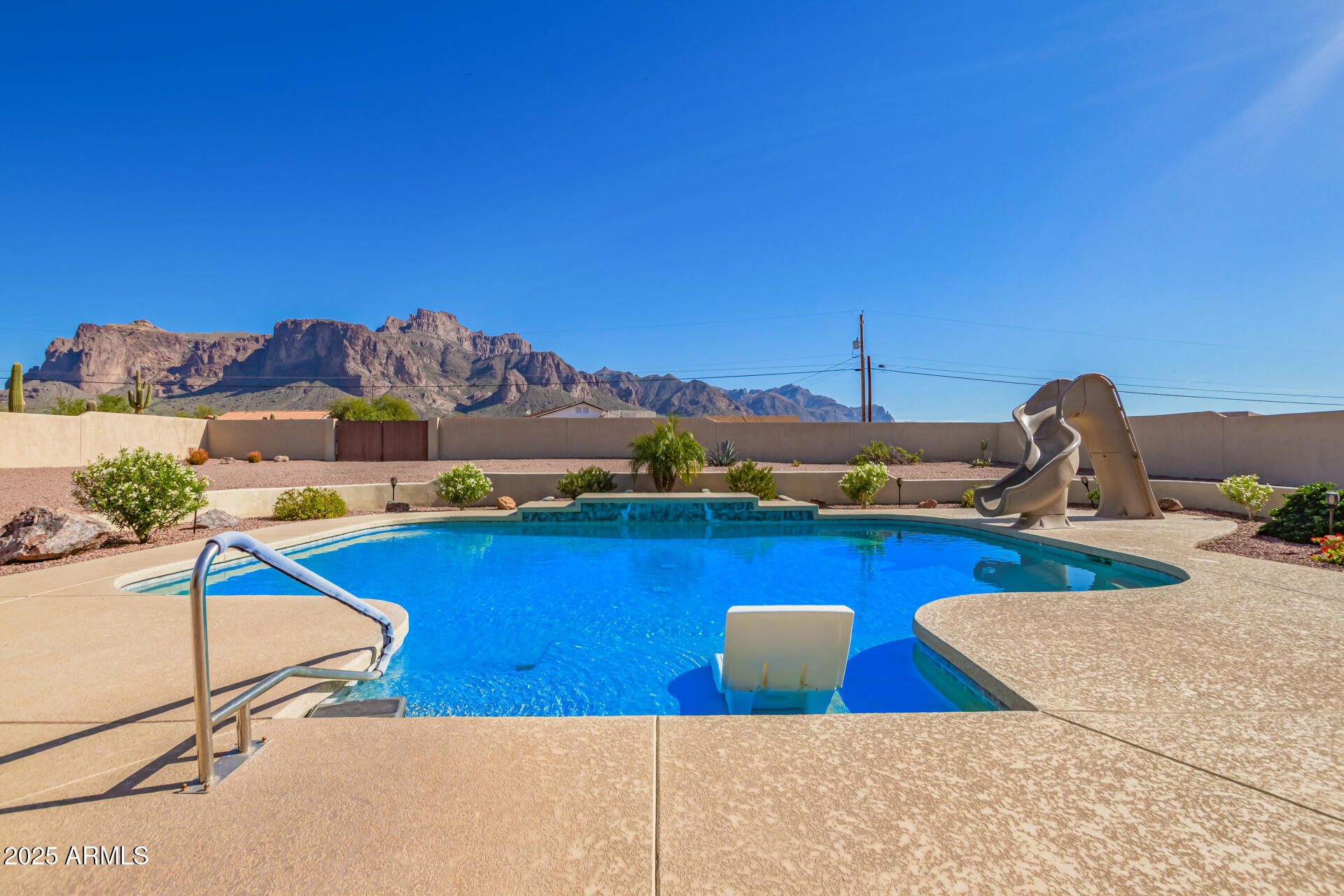 945 North Mountain View Road Apache Junction, AZ 85119 - Photo 43 of 53 a view of a balcony with chairs and wooden floor