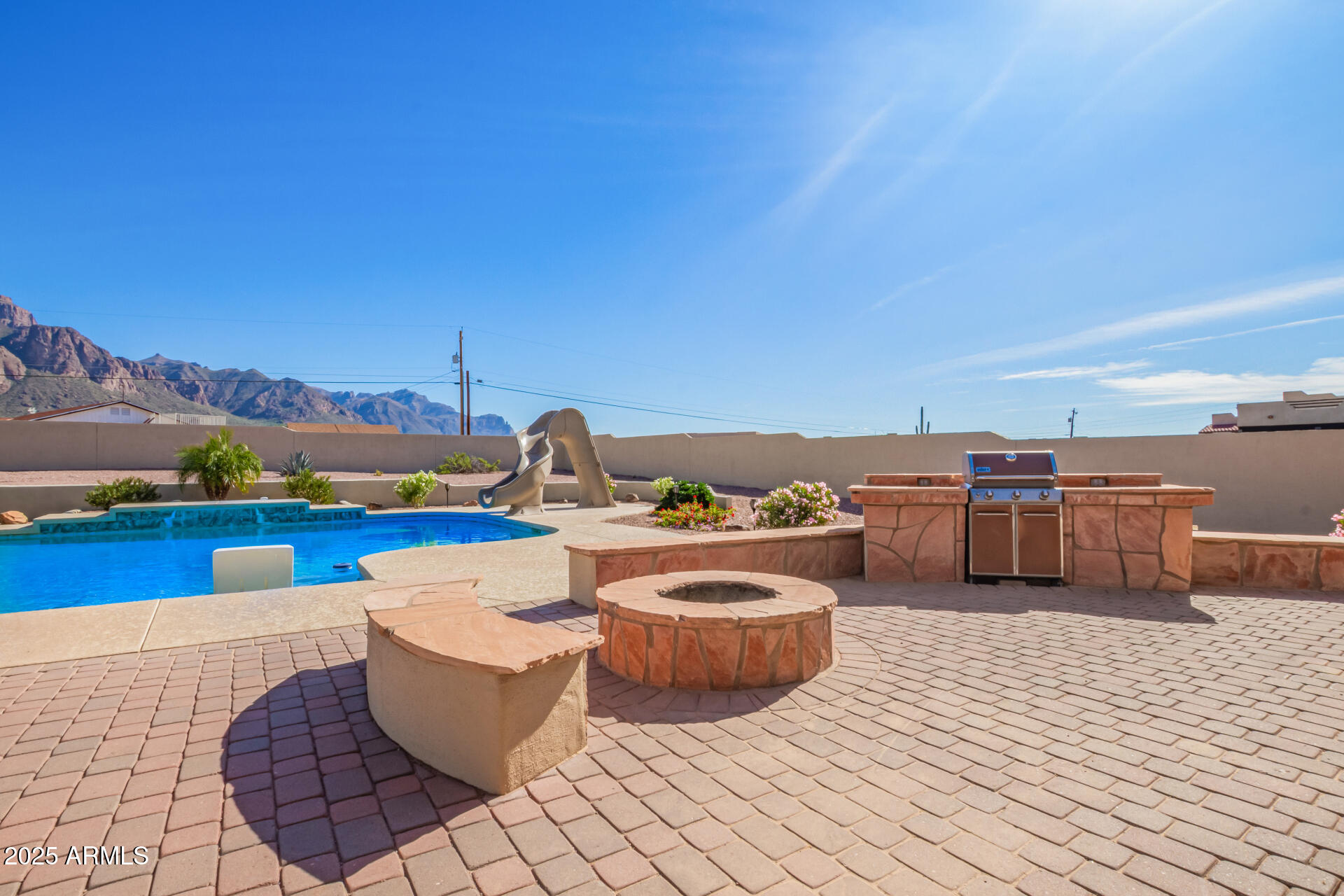 945 North Mountain View Road Apache Junction, AZ 85119 - Photo 44 of 53 a view of a patio and fire pit
