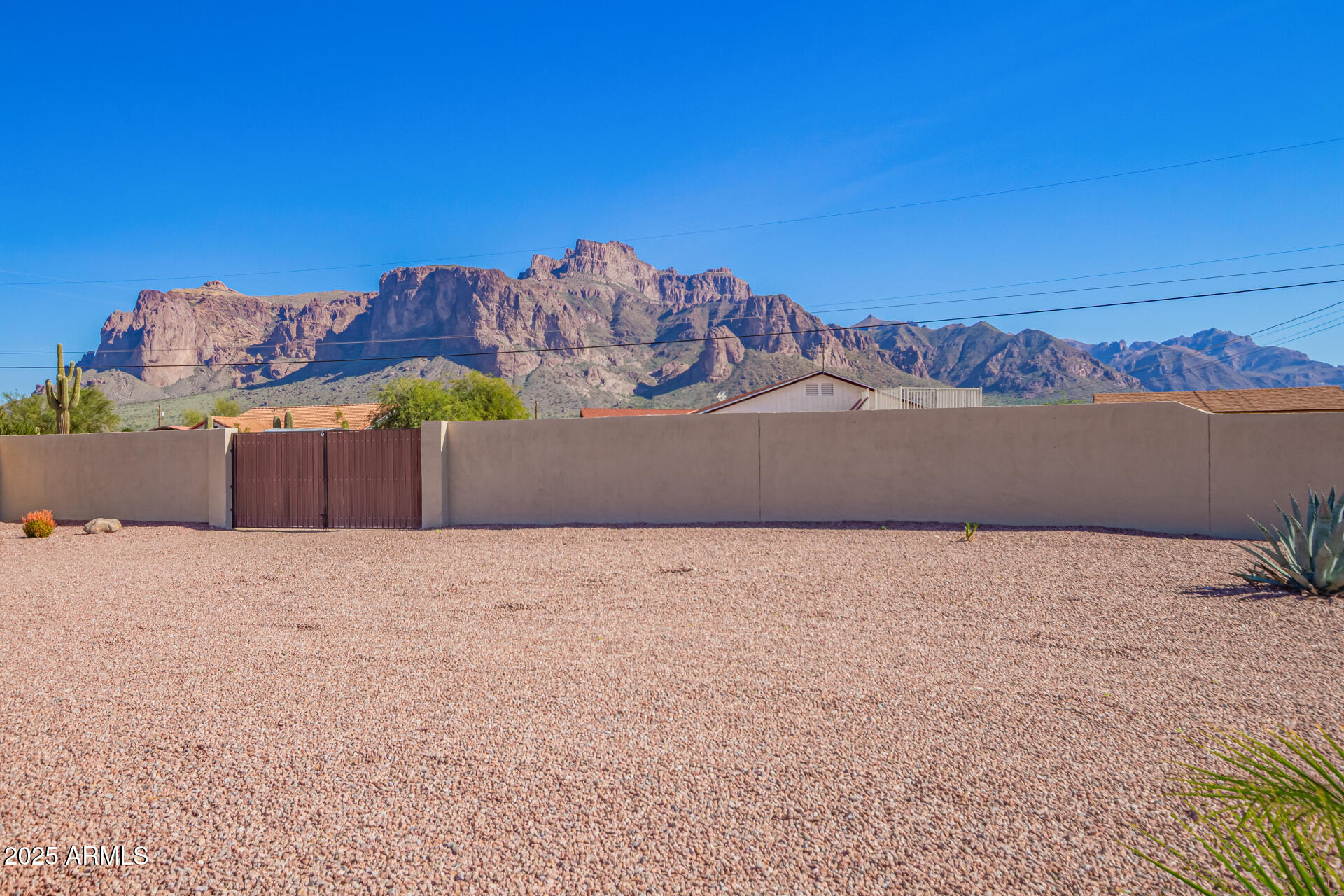 945 North Mountain View Road Apache Junction, AZ 85119 - Photo 45 of 53 a bed sitting in a bedroom next to a lamp