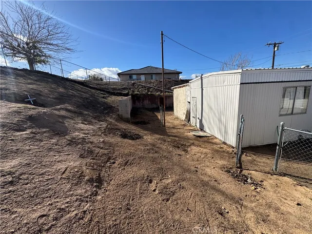 a view of a entryway in the backyard