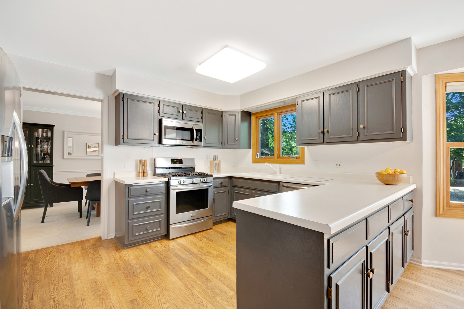 1214 Arthur Road Naperville, IL 60540 - Photo 2 of 21 a kitchen with a stove a sink and a refrigerator