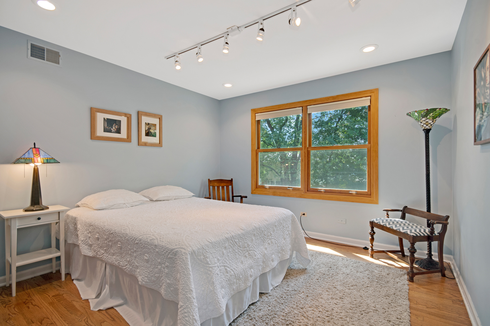 1214 Arthur Road Naperville, IL 60540 - Photo 16 of 21 a bedroom with a bed and a table