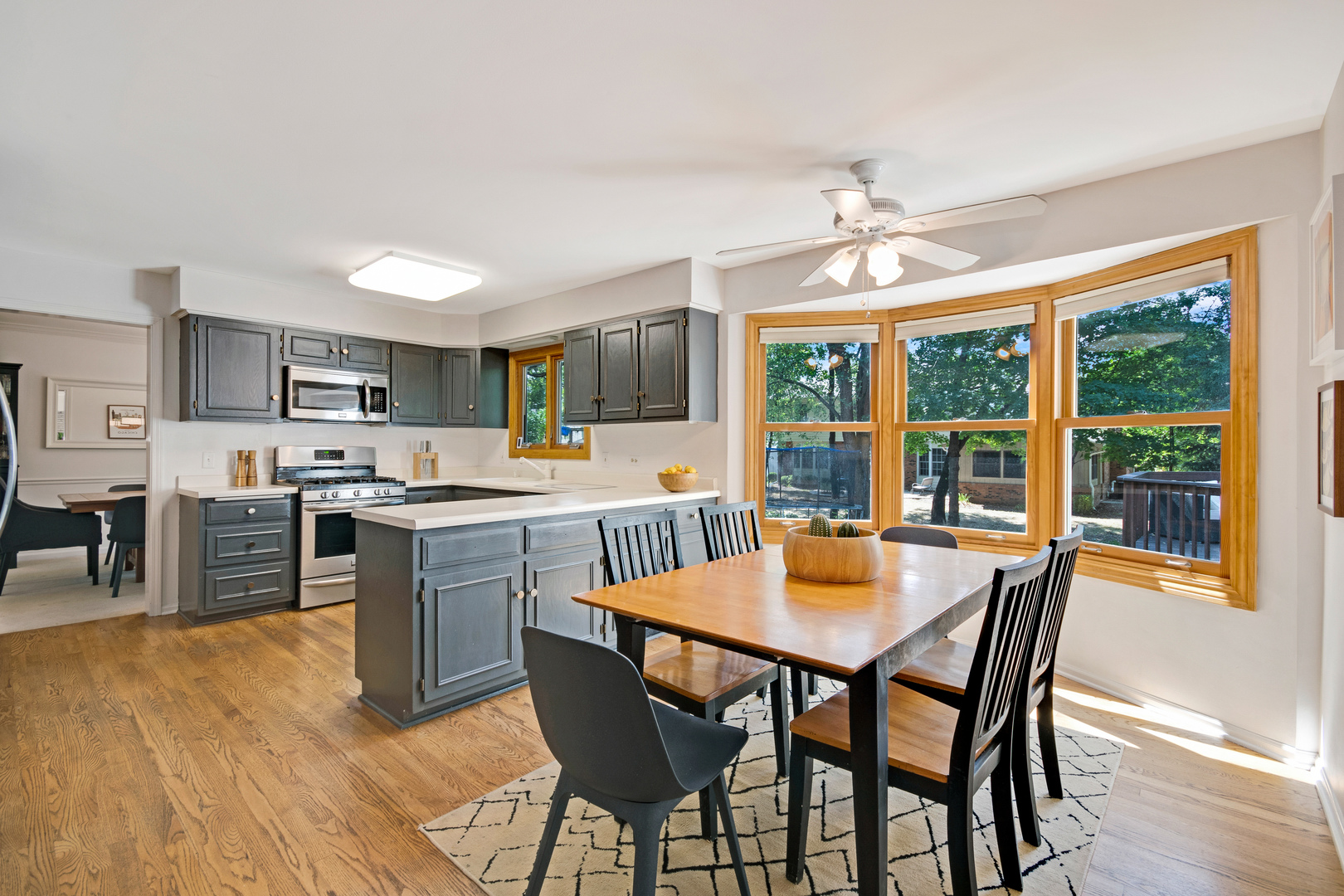 1214 Arthur Road Naperville, IL 60540 - Photo 3 of 21 a view of a dining room with furniture window and outside view
