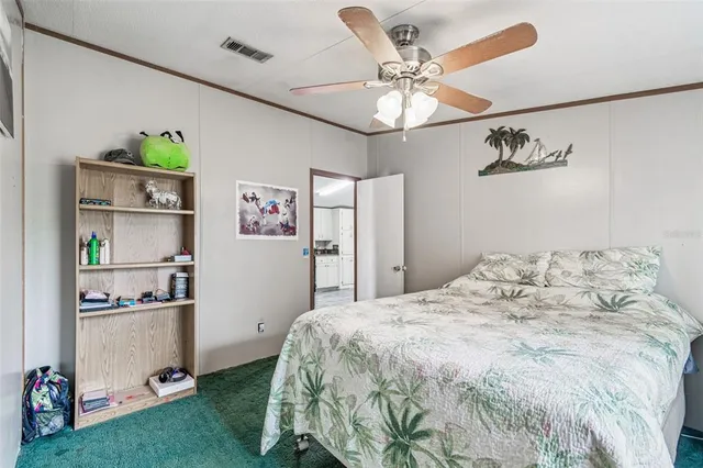 a kitchen with a sink cabinets and stainless steel appliances
