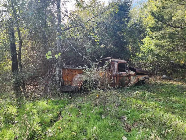 a view of a wooden fence