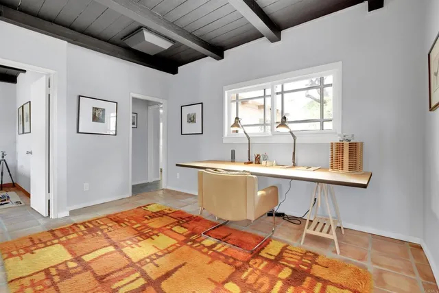 a room with a bed and a table