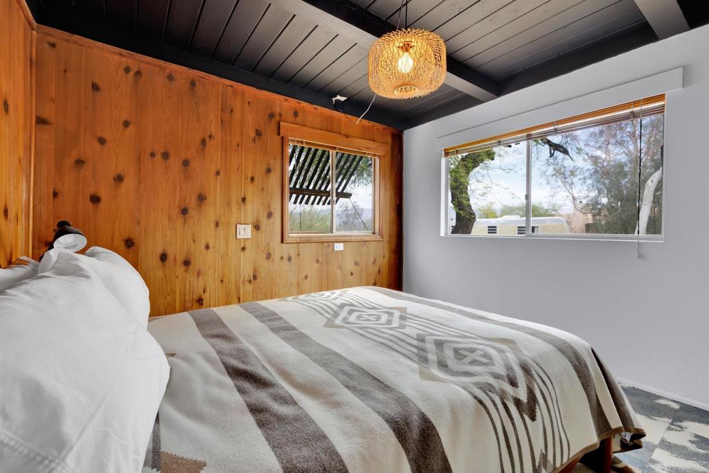 3211 Broken Arrow Road Borrego Springs, CA 92004 - Photo 23 of 46 a bedroom with a bed and window