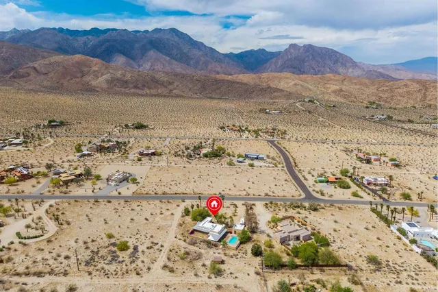 a view of ocean and mountain