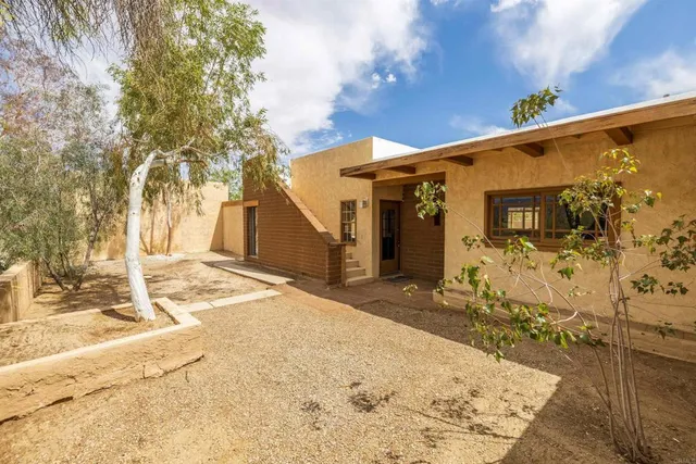 a view of a patio with swimming pool