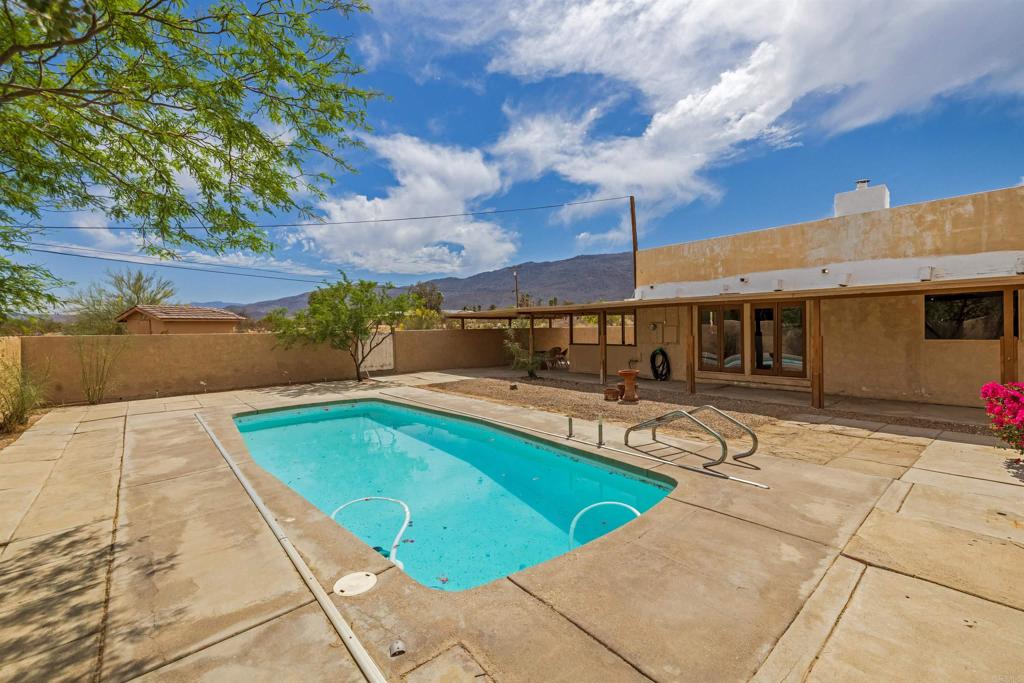 3211 Broken Arrow Road Borrego Springs, CA 92004 - Photo 34 of 46 a view of a patio with swimming pool
