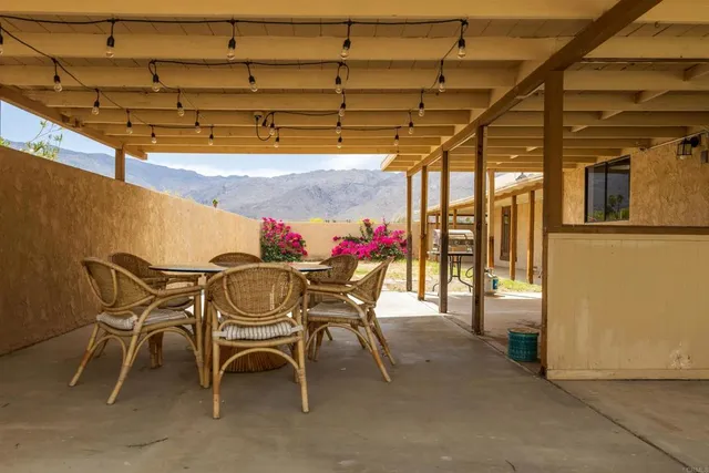 a view of a backyard of the house