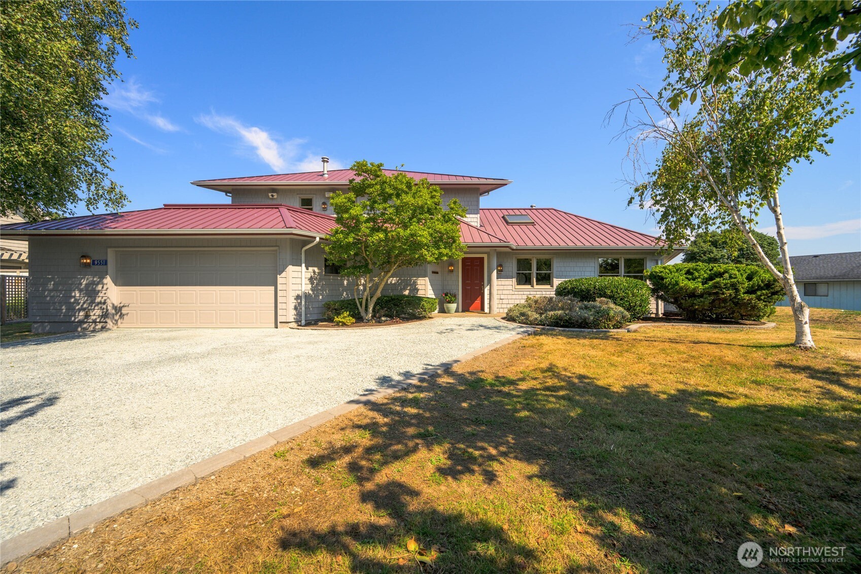 9551 Samish Island Road Bow, WA 98232 - Photo 11 of 40 a view of a house with pool and a yard