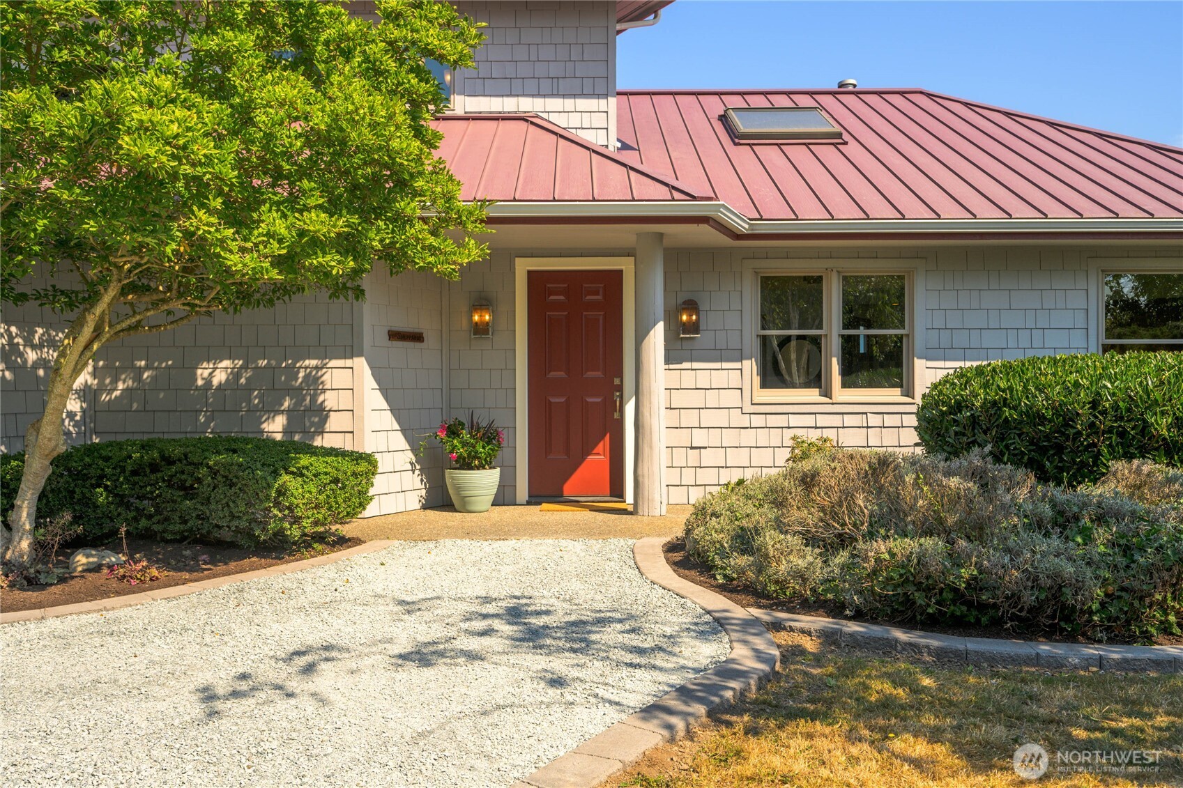 9551 Samish Island Road Bow, WA 98232 - Photo 12 of 40 a view of a house with a porch