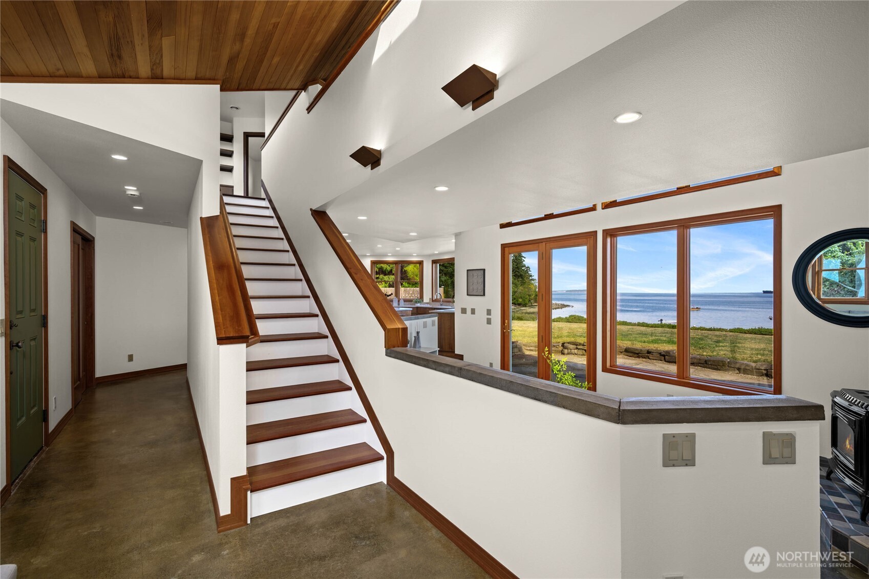 9551 Samish Island Road Bow, WA 98232 - Photo 13 of 40 a view of entryway and hall with wooden floor