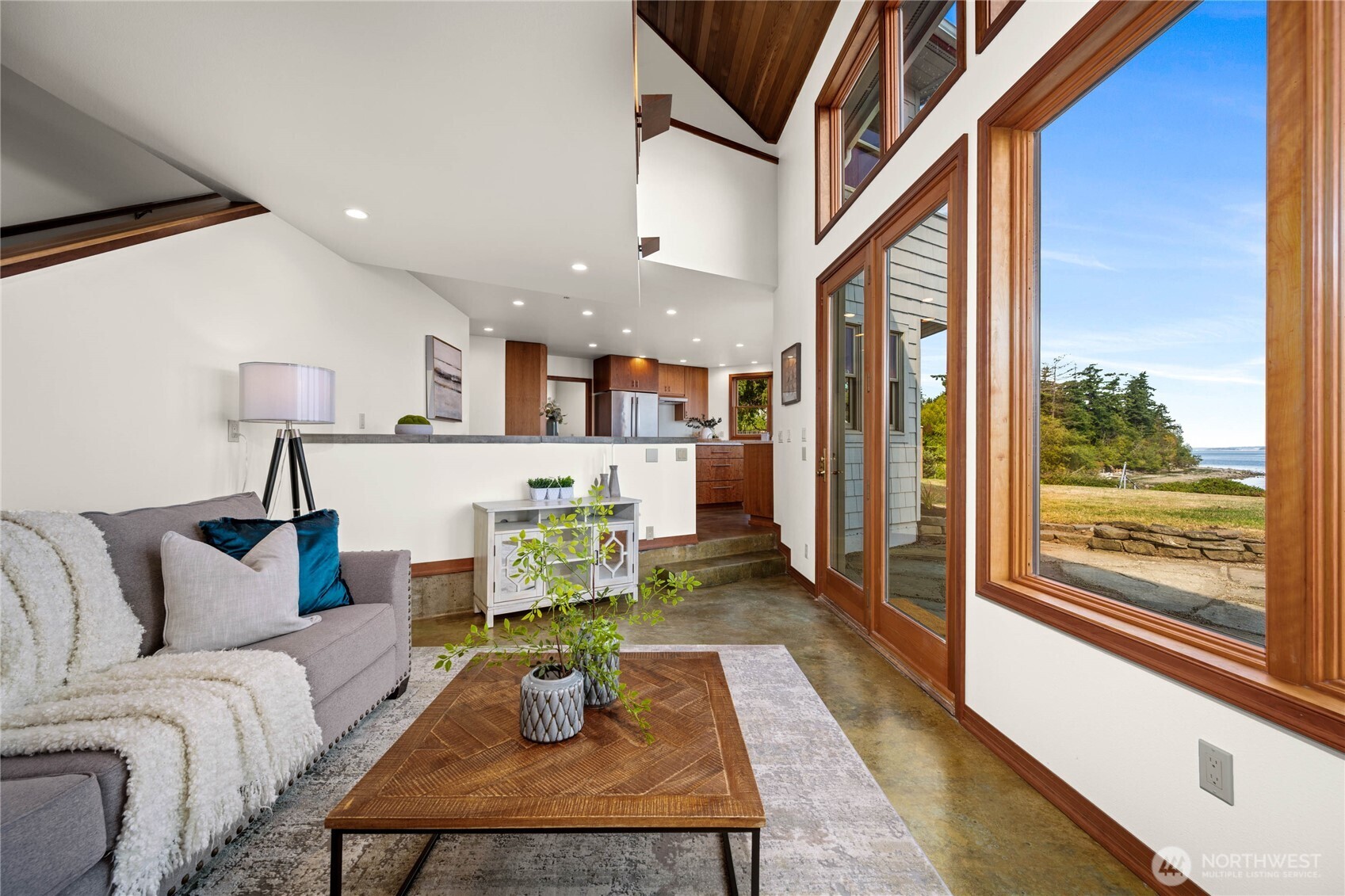 9551 Samish Island Road Bow, WA 98232 - Photo 15 of 40 a living room with furniture and a large window