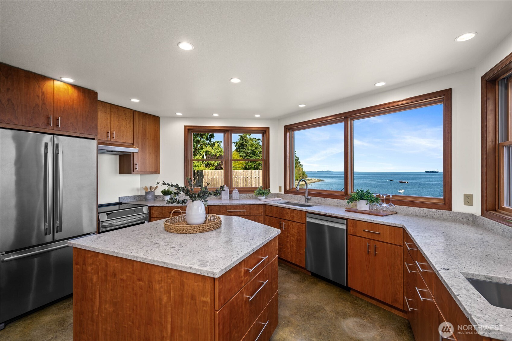 9551 Samish Island Road Bow, WA 98232 - Photo 17 of 40 a kitchen with a sink stove and refrigerator