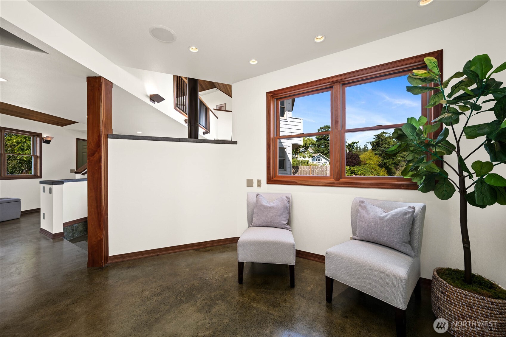 9551 Samish Island Road Bow, WA 98232 - Photo 21 of 40 a living room with furniture and a potted plant