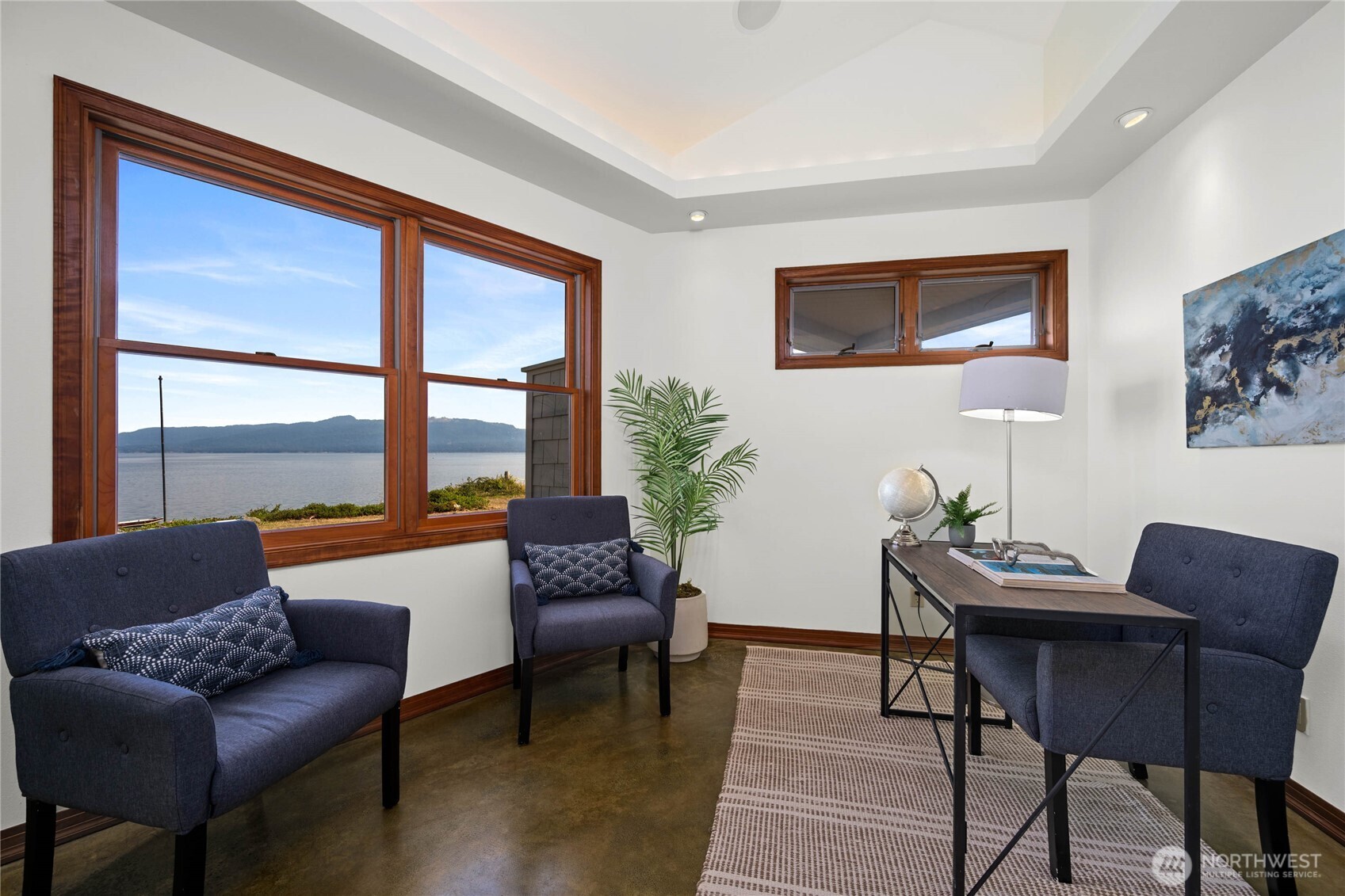 9551 Samish Island Road Bow, WA 98232 - Photo 22 of 40 a living room with furniture and a large window