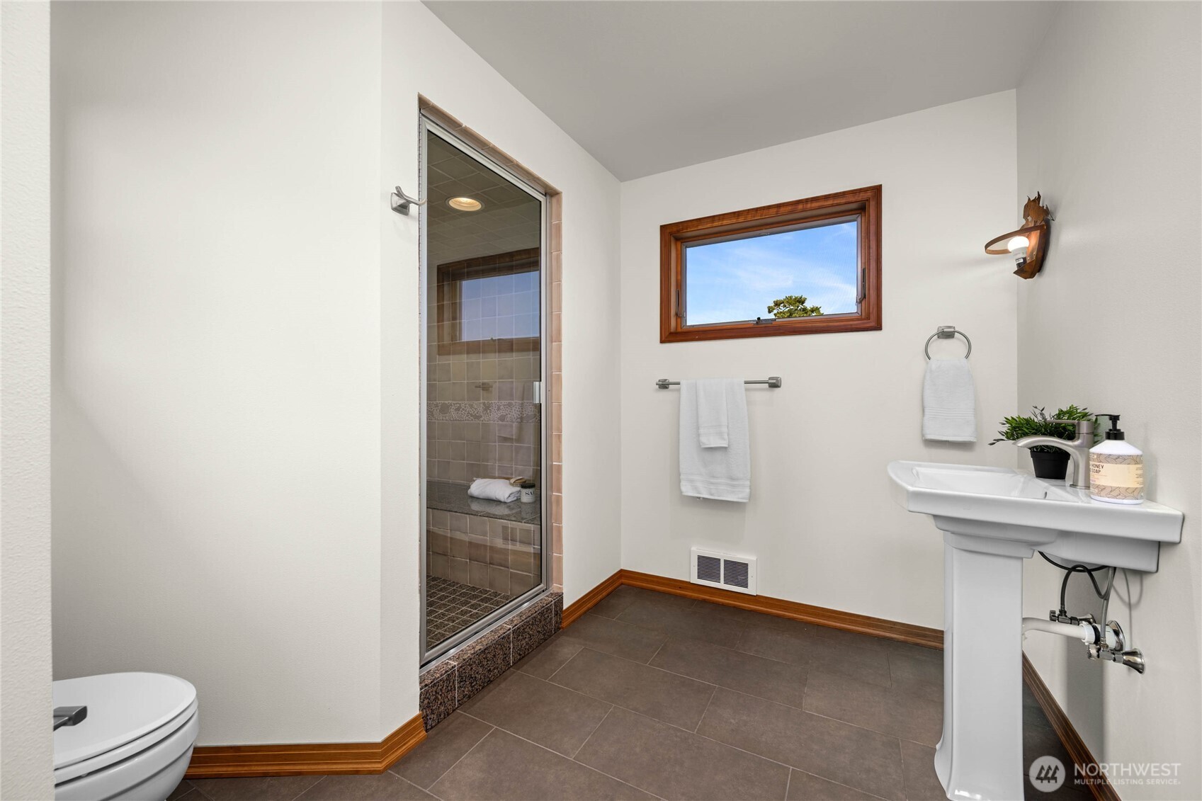 9551 Samish Island Road Bow, WA 98232 - Photo 26 of 40 a view of room with a hallway and wooden floor