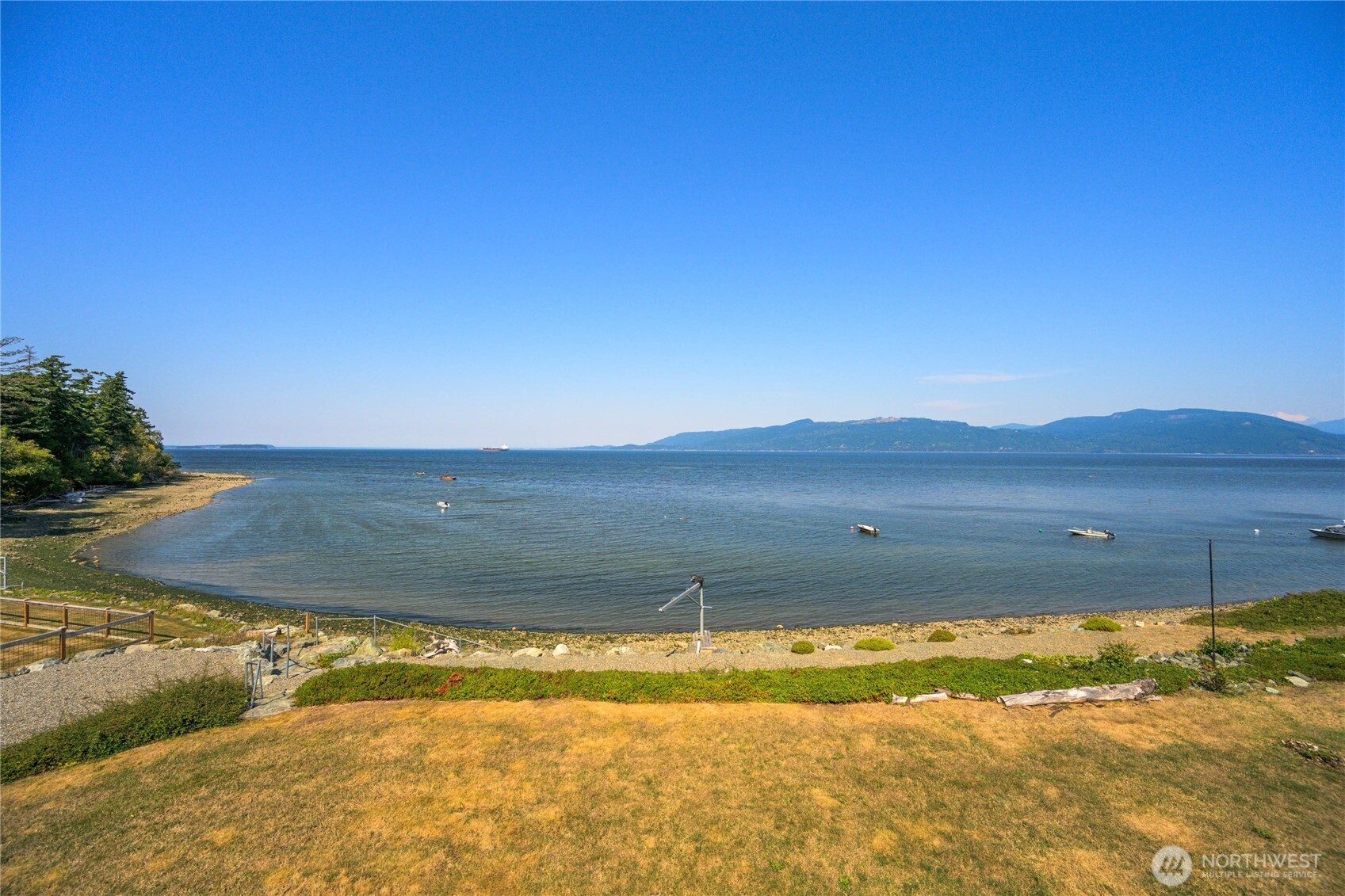 9551 Samish Island Road Bow, WA 98232 - Photo 34 of 40 a view of a house with a yard