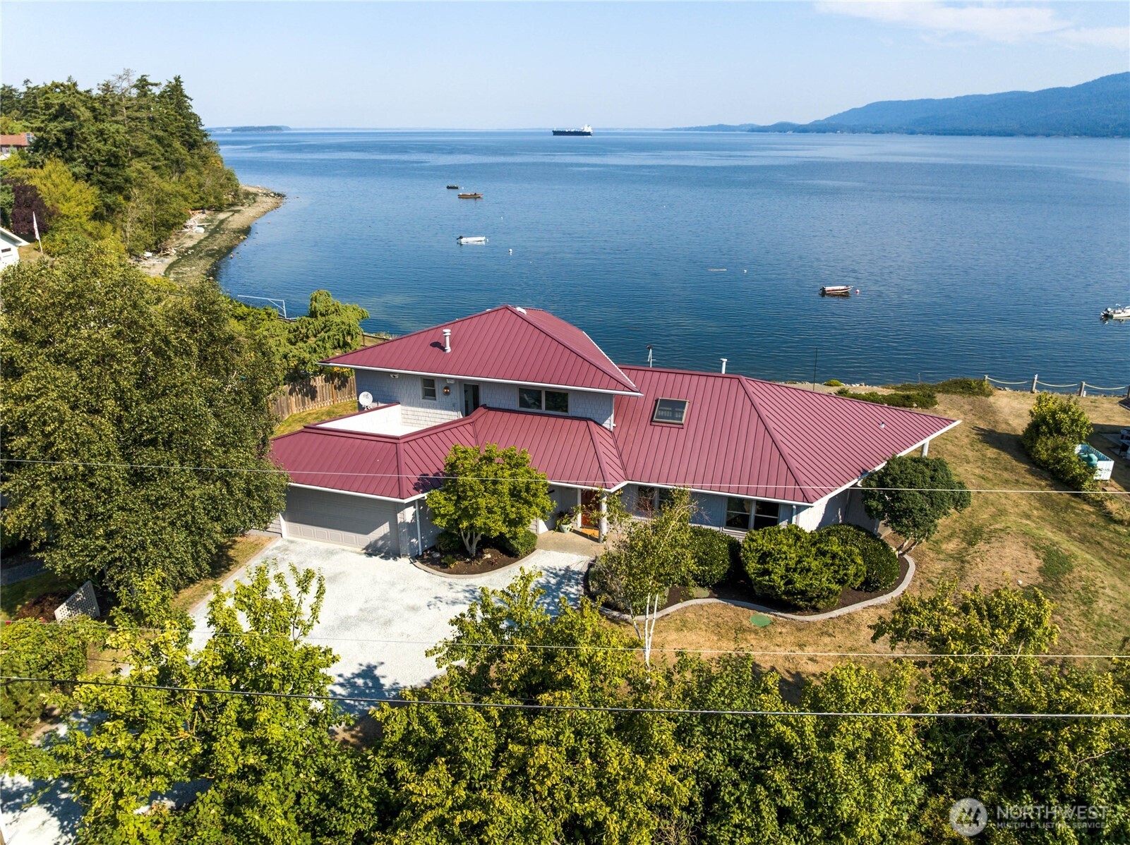 9551 Samish Island Road Bow, WA 98232 - Photo 37 of 40 an aerial view of a house with yard outdoor seating and entertaining space