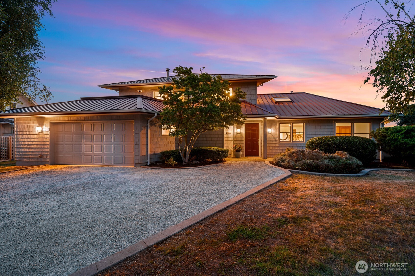 9551 Samish Island Road Bow, WA 98232 - Photo 4 of 40 a view of a house with backyard and a tree