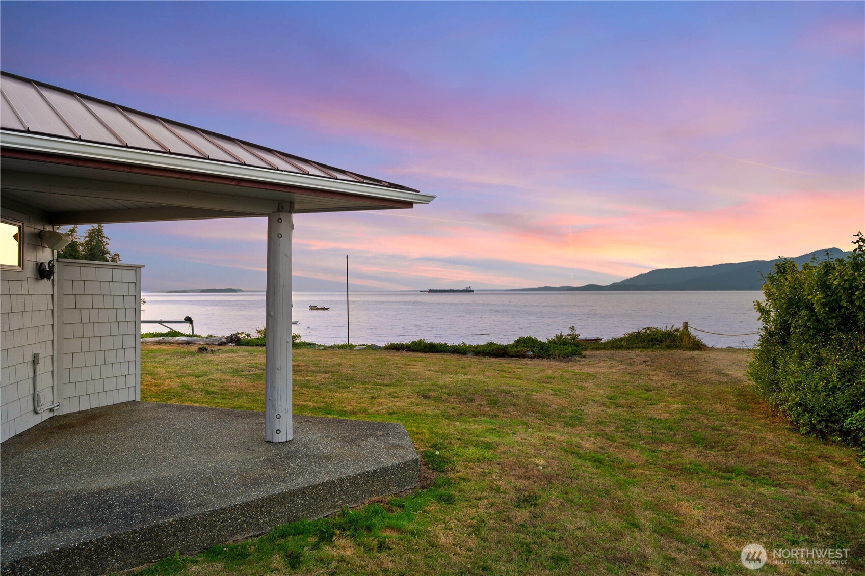9551 Samish Island Road Bow, WA 98232 - Photo 6 of 40 a view of a lake with a outdoor space