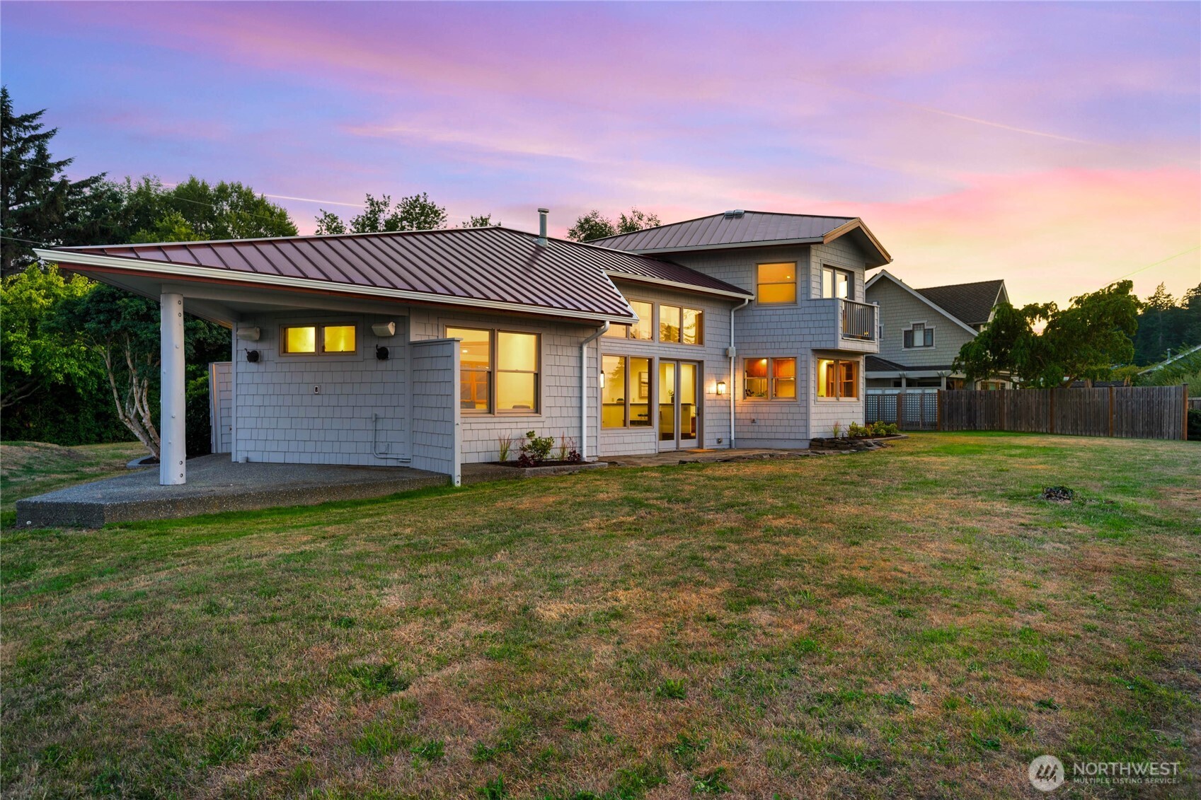 9551 Samish Island Road Bow, WA 98232 - Photo 7 of 40 a front view of a house with a yard