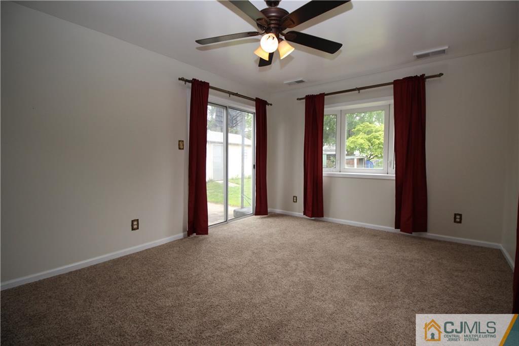 24 Gilmore Road Ewing, NJ 08628 - Photo 13 of 22 a view of an empty room with a window