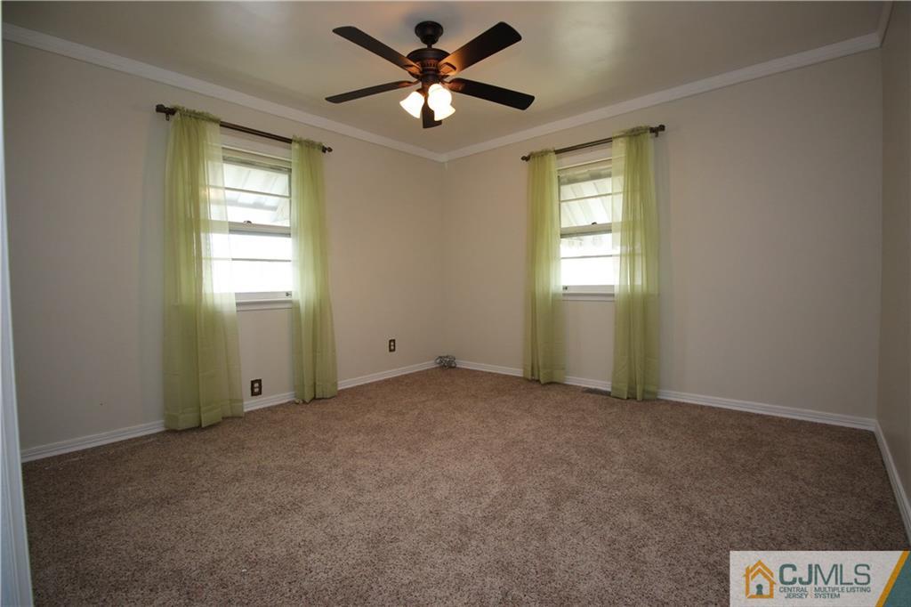 24 Gilmore Road Ewing, NJ 08628 - Photo 15 of 22 a view of an empty room with a window