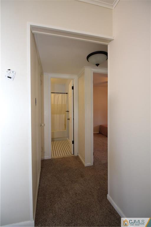 24 Gilmore Road Ewing, NJ 08628 - Photo 18 of 22 a view of a hallway with wooden floor