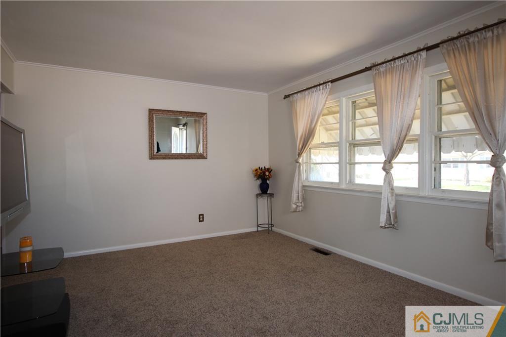 24 Gilmore Road Ewing, NJ 08628 - Photo 5 of 22 a view of empty room with window