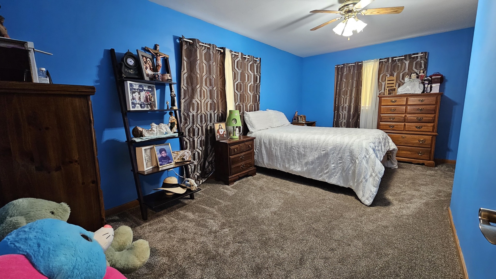 703 Lincoln Street Harvard, IL 60033 - Photo 14 of 27 a bedroom with a bed furniture and a window