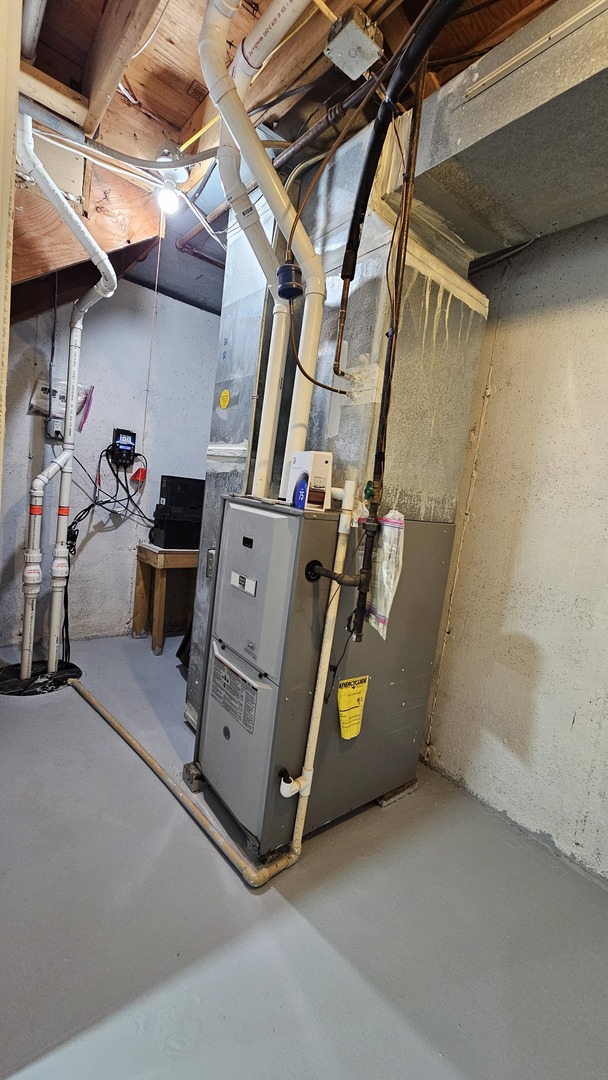 703 Lincoln Street Harvard, IL 60033 - Photo 21 of 27 a view of storage and utility room