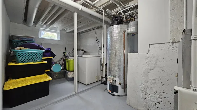 a bathroom with a bathtub and shower