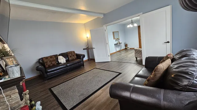 a living room with furniture and a couch