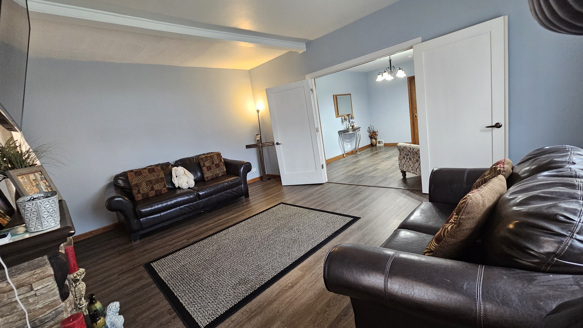 703 Lincoln Street Harvard, IL 60033 - Photo 3 of 27 a living room with furniture and a couch