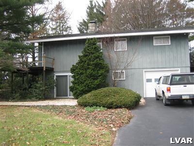 640 Bok Road Nazareth, PA 18064 - Photo 2 of 28 a car parked in front of a white house