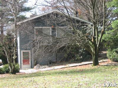 640 Bok Road Nazareth, PA 18064 - Photo 3 of 28 a view of a yard in front of a tree