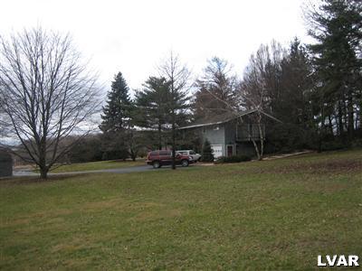 640 Bok Road Nazareth, PA 18064 - Photo 9 of 28 a view of a house with a yard and sitting area