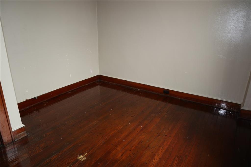426 Broad Avenue, Unit 2 Belle Vernon, PA 15012 - Photo 12 of 13 a view of empty room with wooden floor