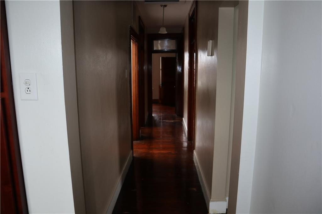 426 Broad Avenue, Unit 2 Belle Vernon, PA 15012 - Photo 5 of 13 a view of a hallway with wooden floor