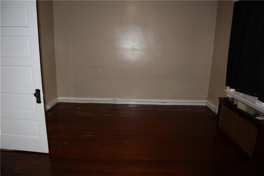 426 Broad Avenue, Unit 2 Belle Vernon, PA 15012 - Photo 7 of 13 a view of an empty room with wooden floor