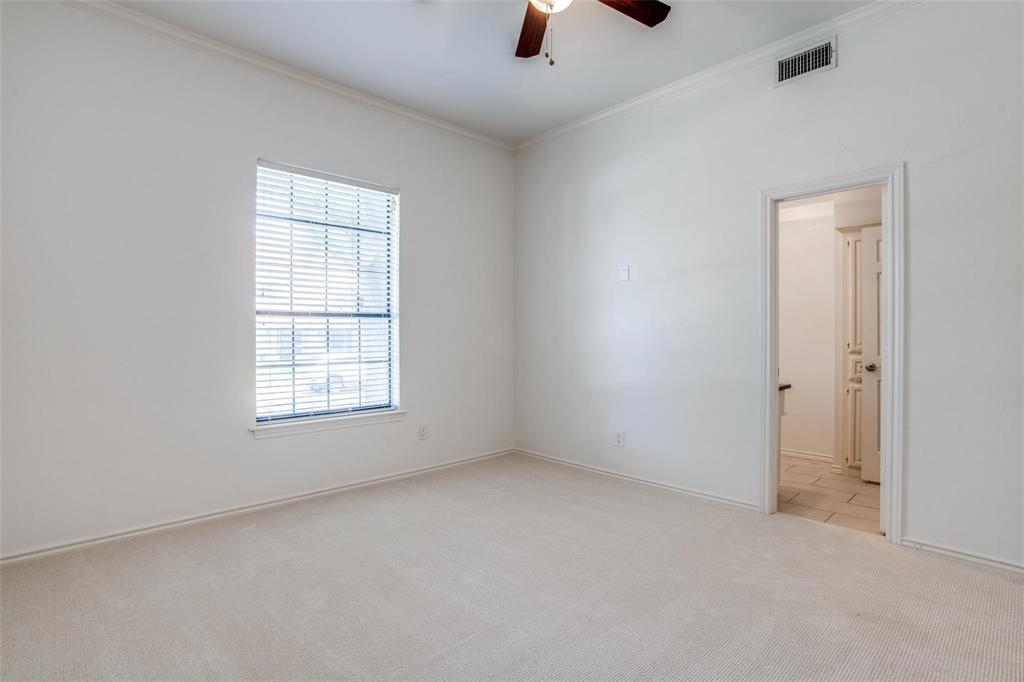 6926 Northwood Road Dallas, TX 75225 - Photo 25 of 29 an empty room with windows