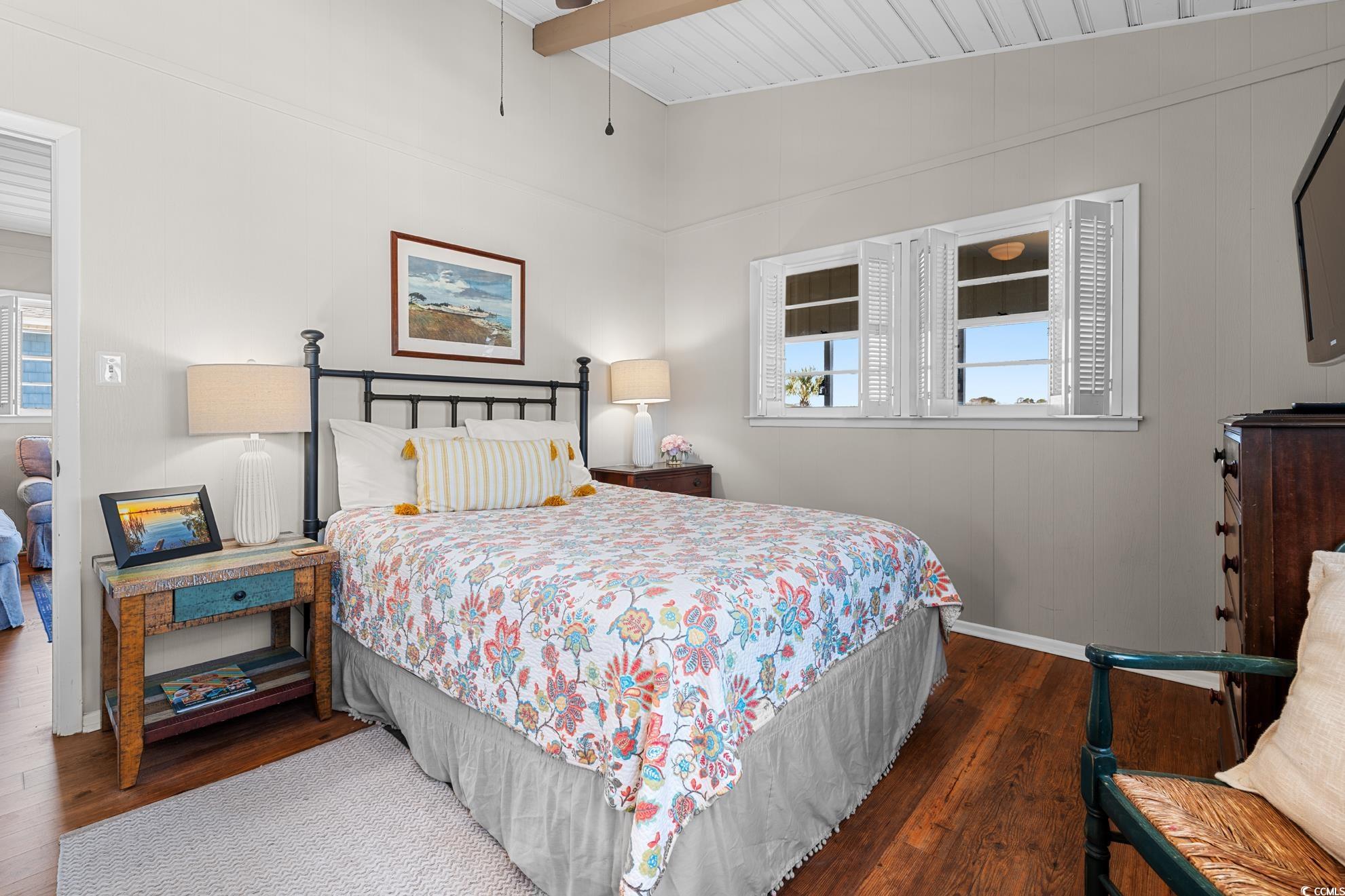 342 State Rd S-26-530 Murrells Inlet, SC 29576 - Photo 25 of 38 Bedroom with beamed ceiling and dark hardwood / wood-style floors