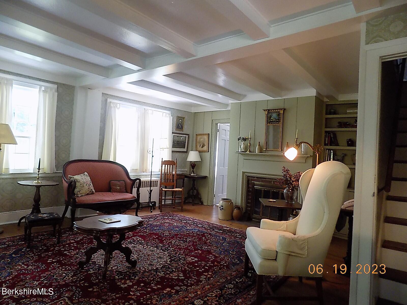 1014 Salisbury Road Sheffield, MA 01257 - Photo 5 of 36 a living room with furniture and wooden floor